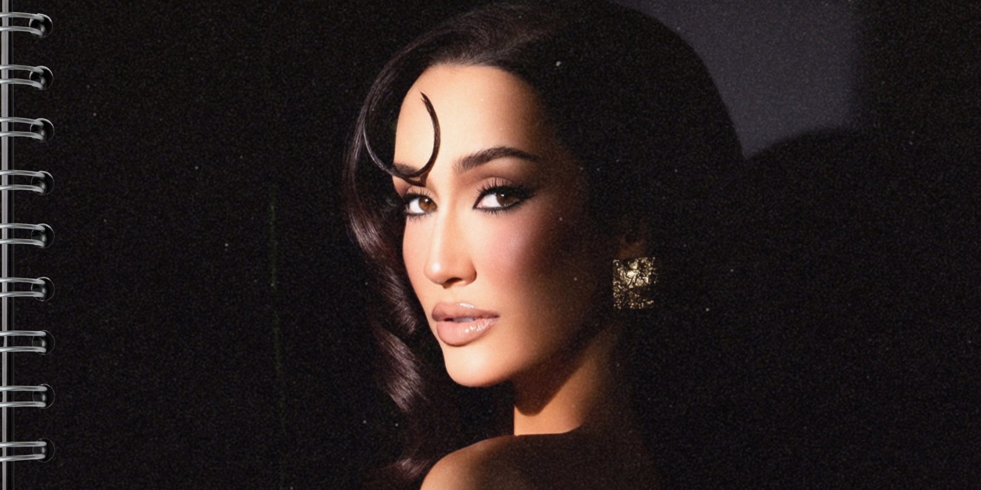 Mackenzie Kern in old-Hollywood glam, looking over her shoulder, on a spiral notebook page